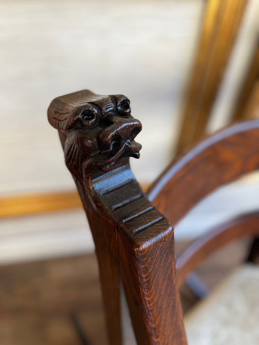 Antique Victorian Era Grotesque Hand Carved Oak Rocking Chair
