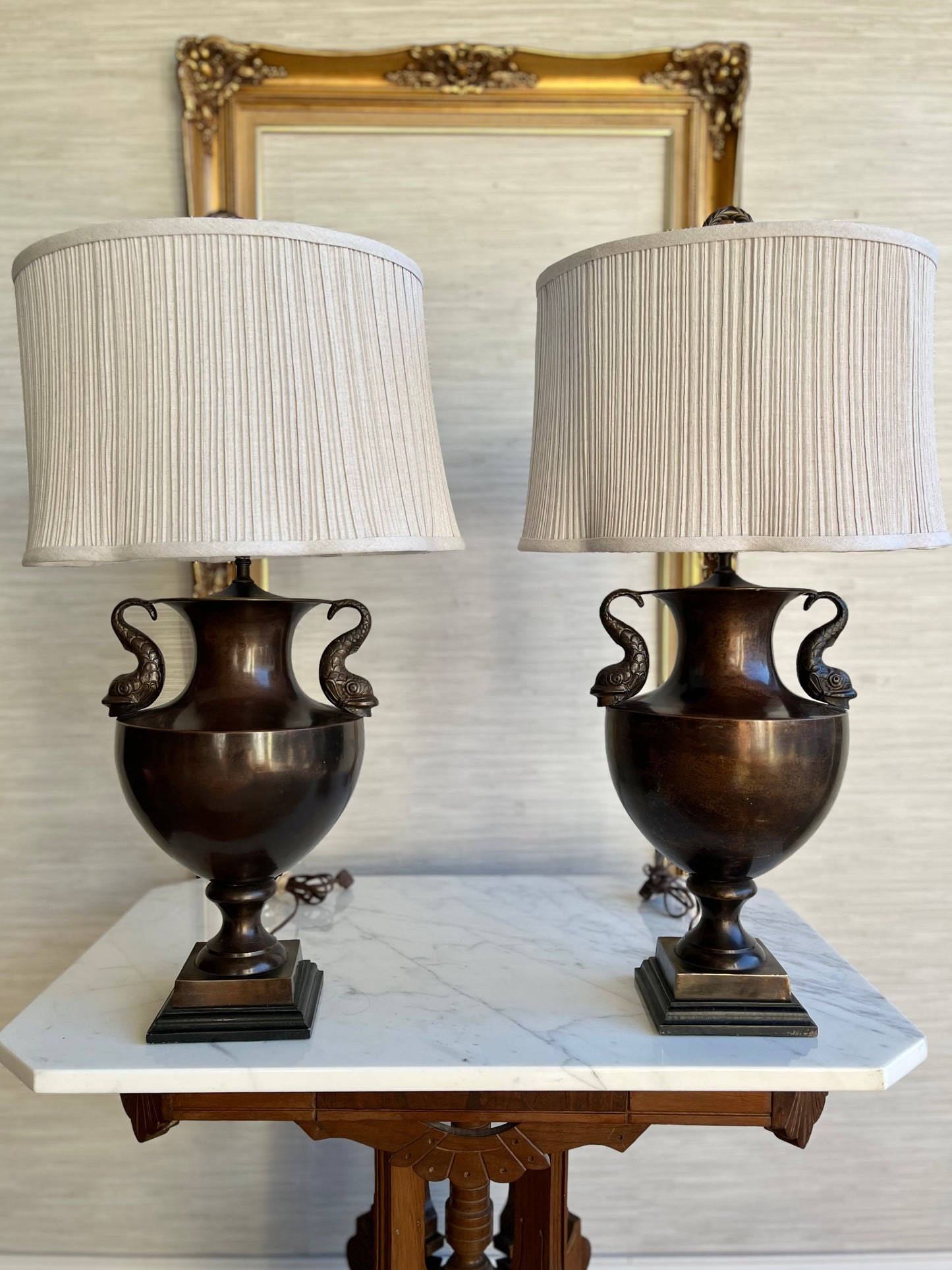 Pair of Stonegate Designs Bronze-Finish Koi-Handled Urn Lamps with Clover-Shaped Pleated Shades