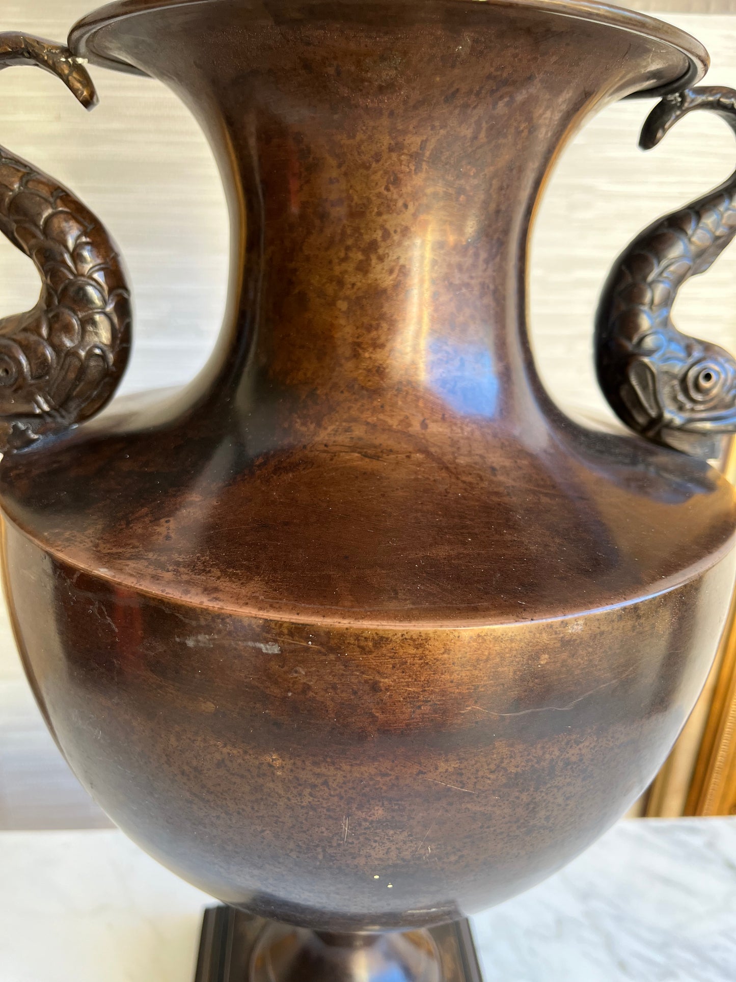 Pair of Stonegate Designs Bronze-Finish Koi-Handled Urn Lamps with Clover-Shaped Pleated Shades