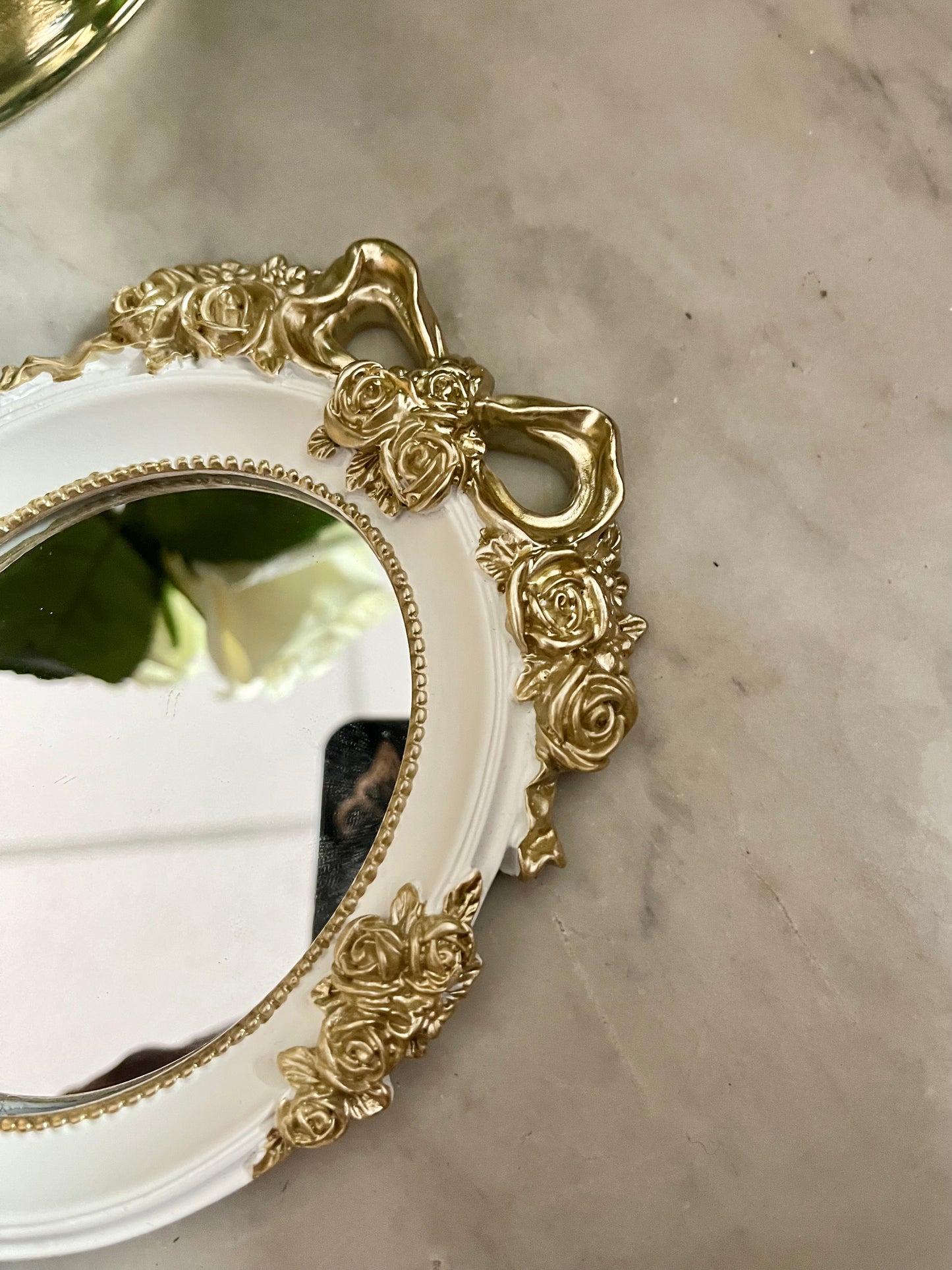 Vintage style rosette hand held vanity mirror